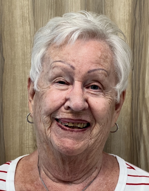 Smiling senior woman with damaged teeth