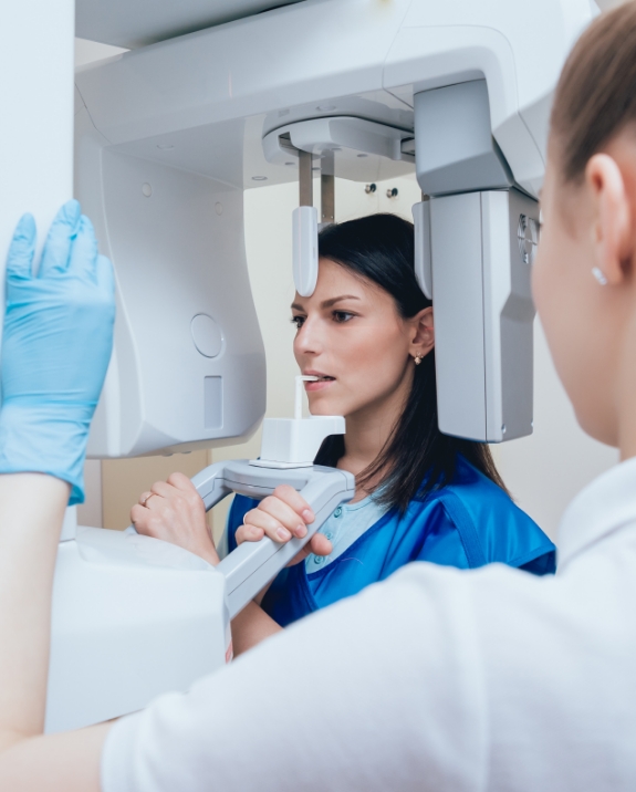 Woman getting a dental scan with advanced dental technology in Mesa